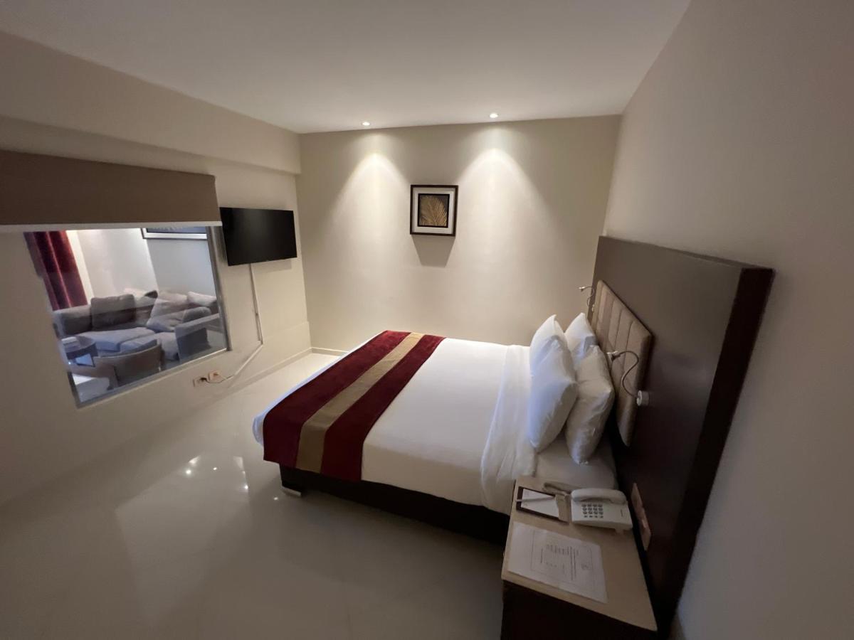 Grand Ocean El Sokhna Hotel Ain Sukhna Eksteriør billede A bedroom at the hotel